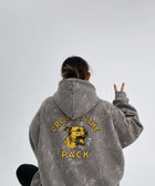 Close-up of Protect The Pack camo hoodie sleeve and graphic print texture