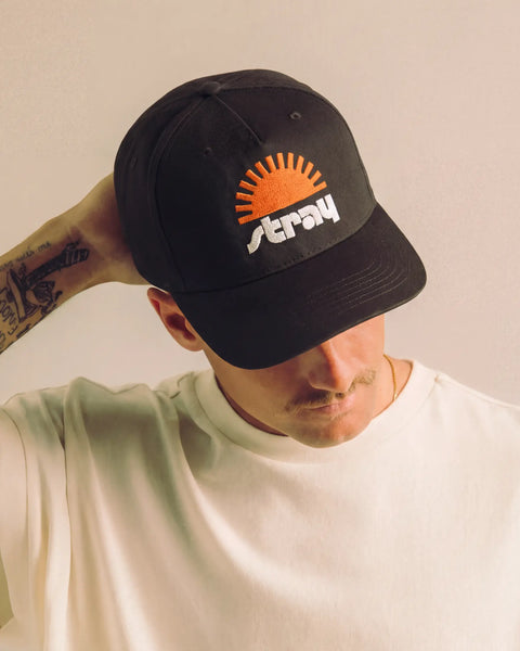 Stray Sun Rise Hat - Black detail — dog lover hat that funds shelter meals · Stray Project