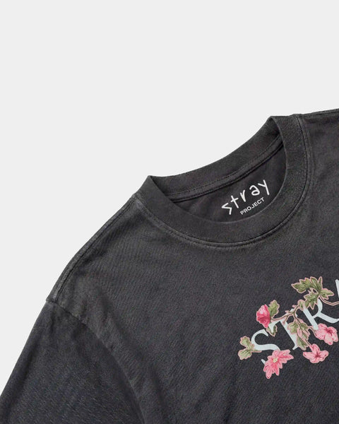 Inspire Flower Tee detail — rescue dog tee that funds shelter meals · Stray Project
