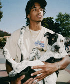 The Rescue Club Tee detail — rescue dog tee that funds shelter meals · Stray Project