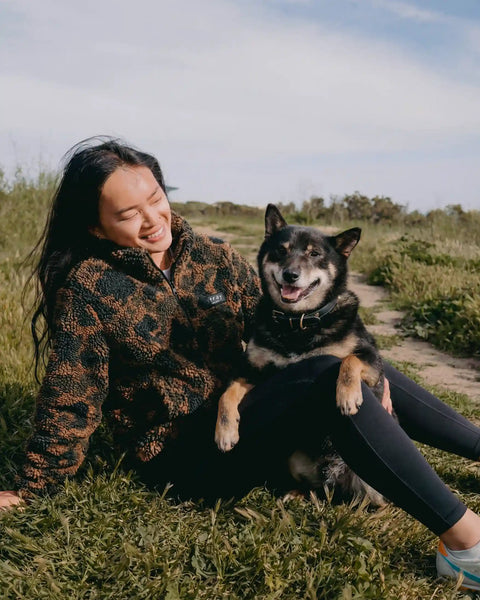 Protect The Pack Camo Fleece lifestyle styling — rescue dog fleece from Stray Project