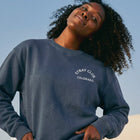 Stray Club Denver Sweatshirt detail — rescue dog sweatshirt that funds shelter meals · Stray Project