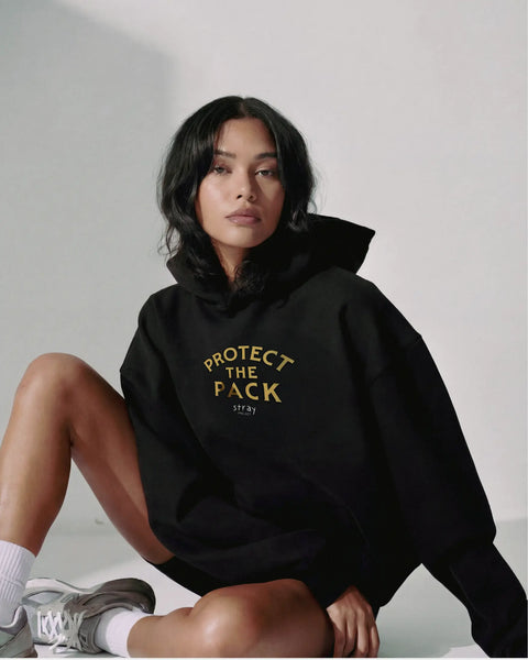 Protect The Pack Hoodie detail — shelter dog hoodie that funds shelter meals · Stray Project