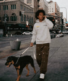 Loud & Proud Hoodie detail — shelter dog hoodie that funds shelter meals · Stray Project
